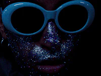a person with glitter on his face