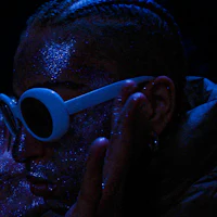 a person with glitter on his face