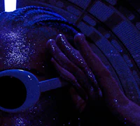 a person wearing a pair of sunglasses in a dark tunnel